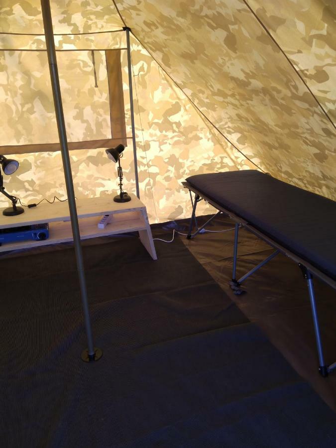 Tent-Ok Opende Luaran gambar